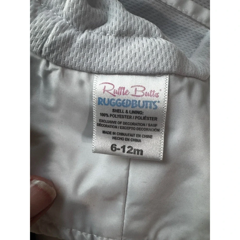RuffleButts White Baby Sun Hat Wide Brim Chin Ties 6-12m UPF Protection